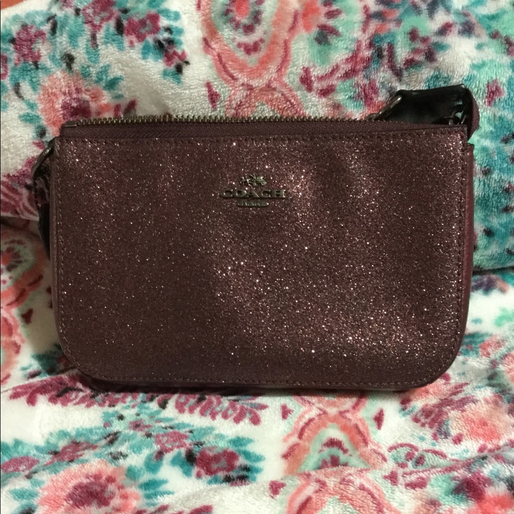 Coach clutch. Small with shoulder/hand strap